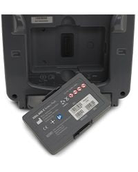 ZOLL AED 3 Battery Pack next to back of AED 3